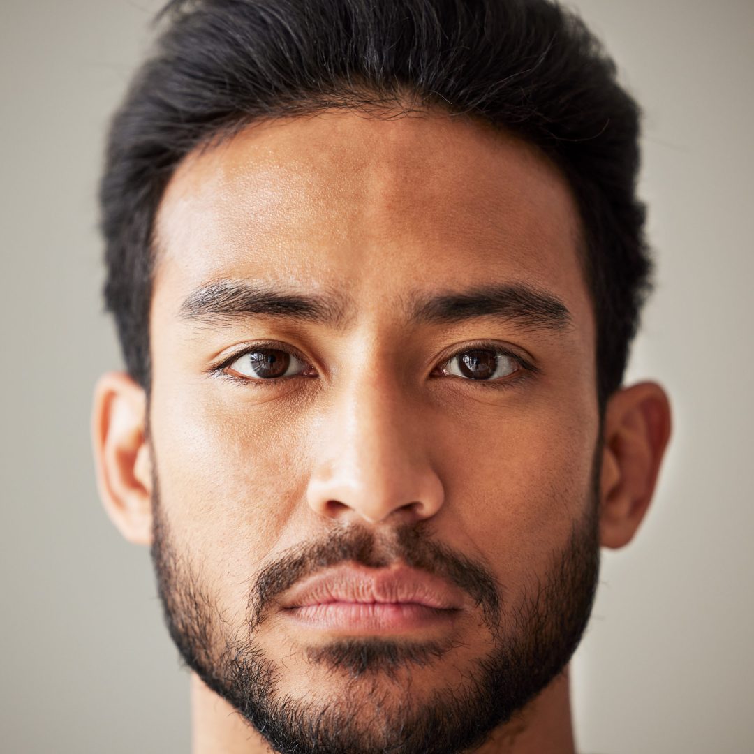 Face, portrait and serious asian man in studio with focus, wellness and awareness. Headshot of a yo.